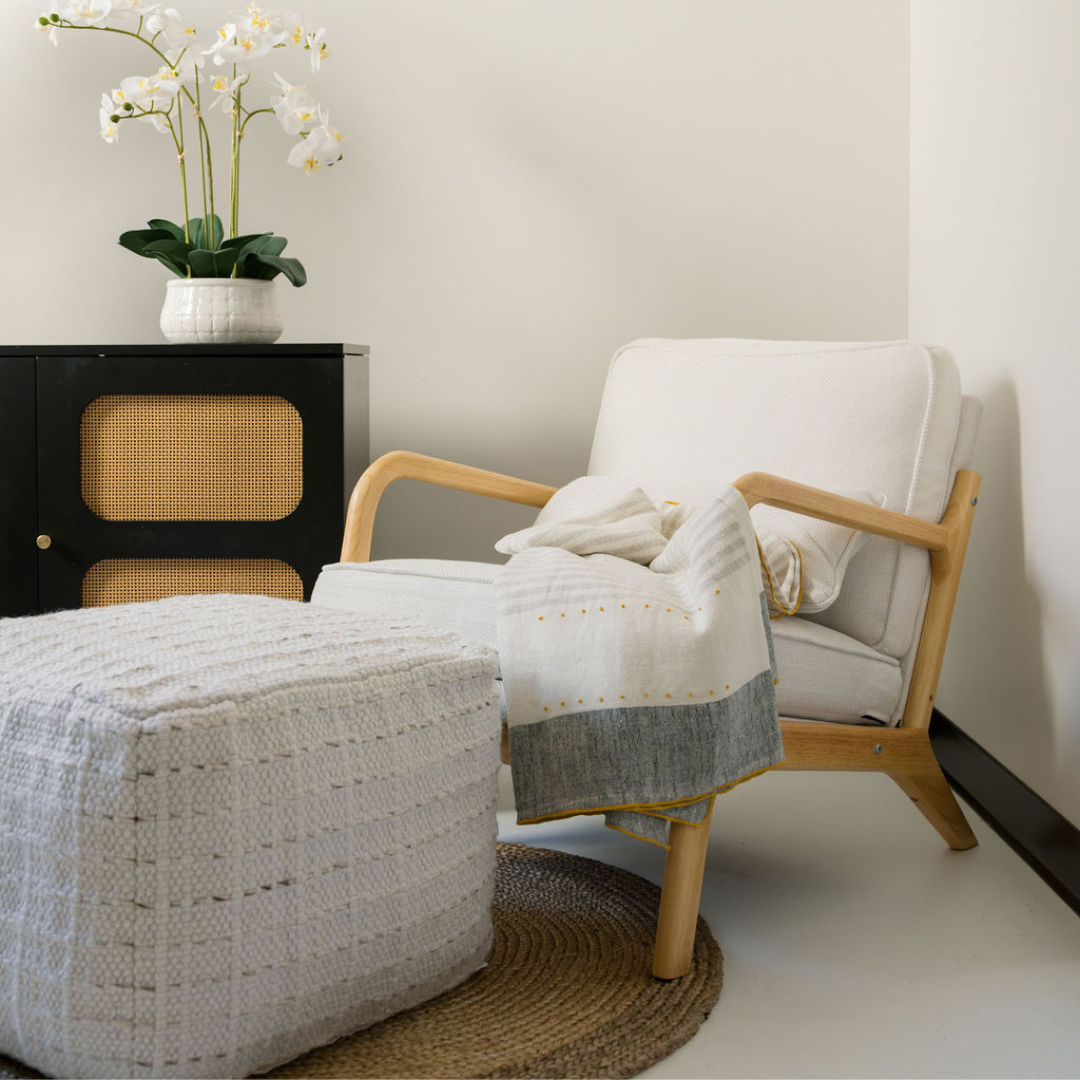 Square striped woven ottoman pouf in earthy tones